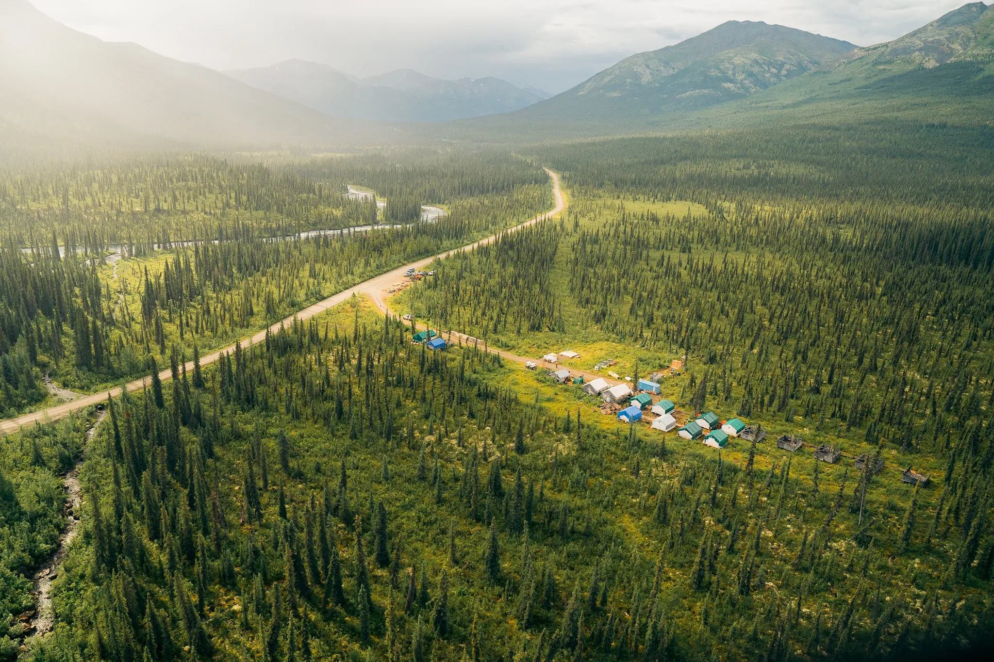 Aerial view of the road into Justin camp through the Yukon forest